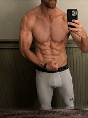 Used full lengthUnder Armour Men's White Compression Tights with Black Waistband